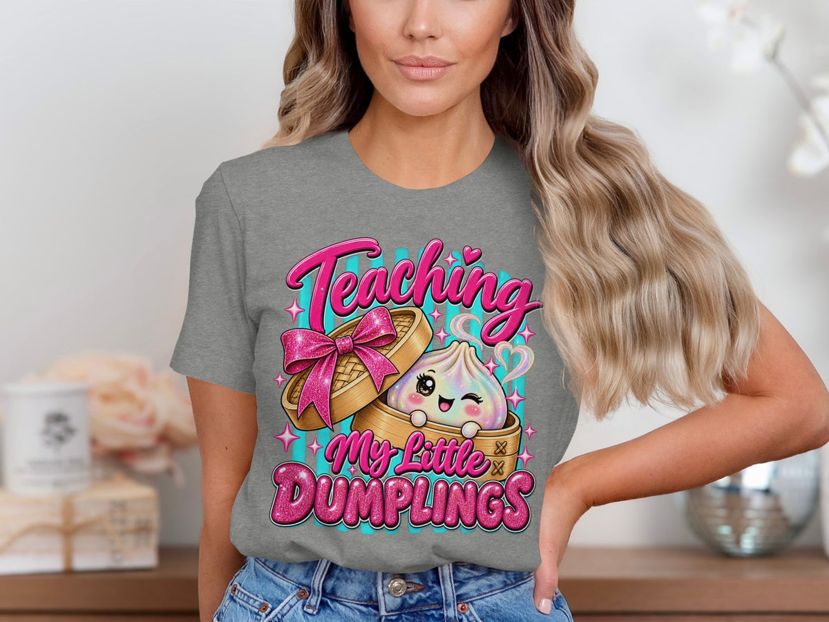 Teaching My Little Dumplings graphic on a grey t-shirt.