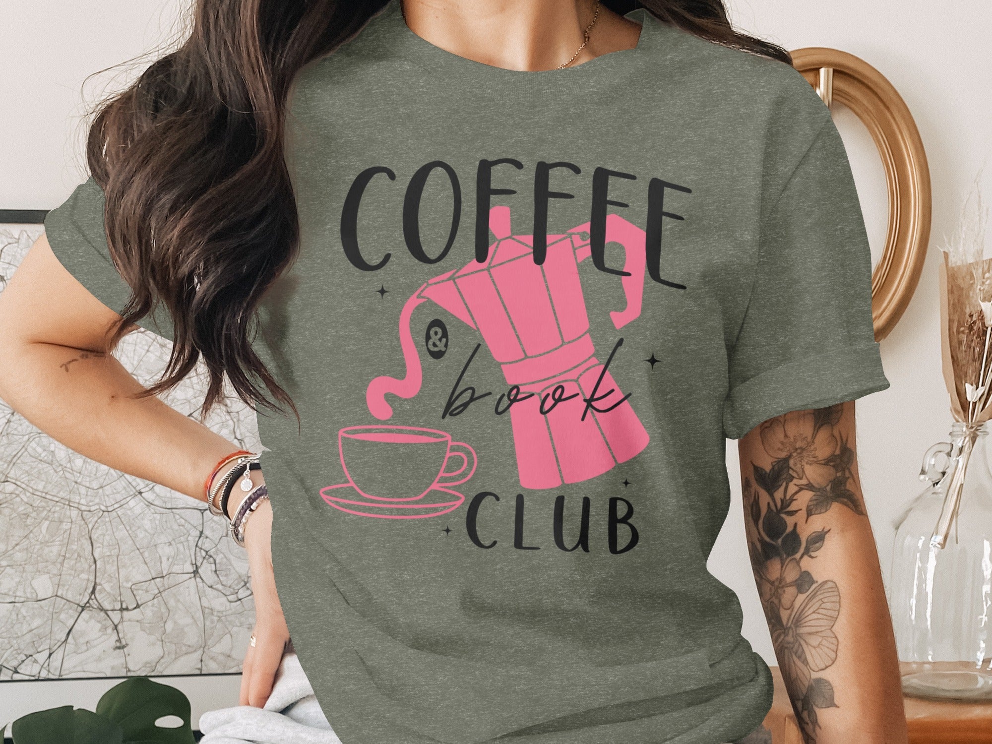 Green t-shirt with pink coffee pot, cup, and "Coffee & Book Club" text.