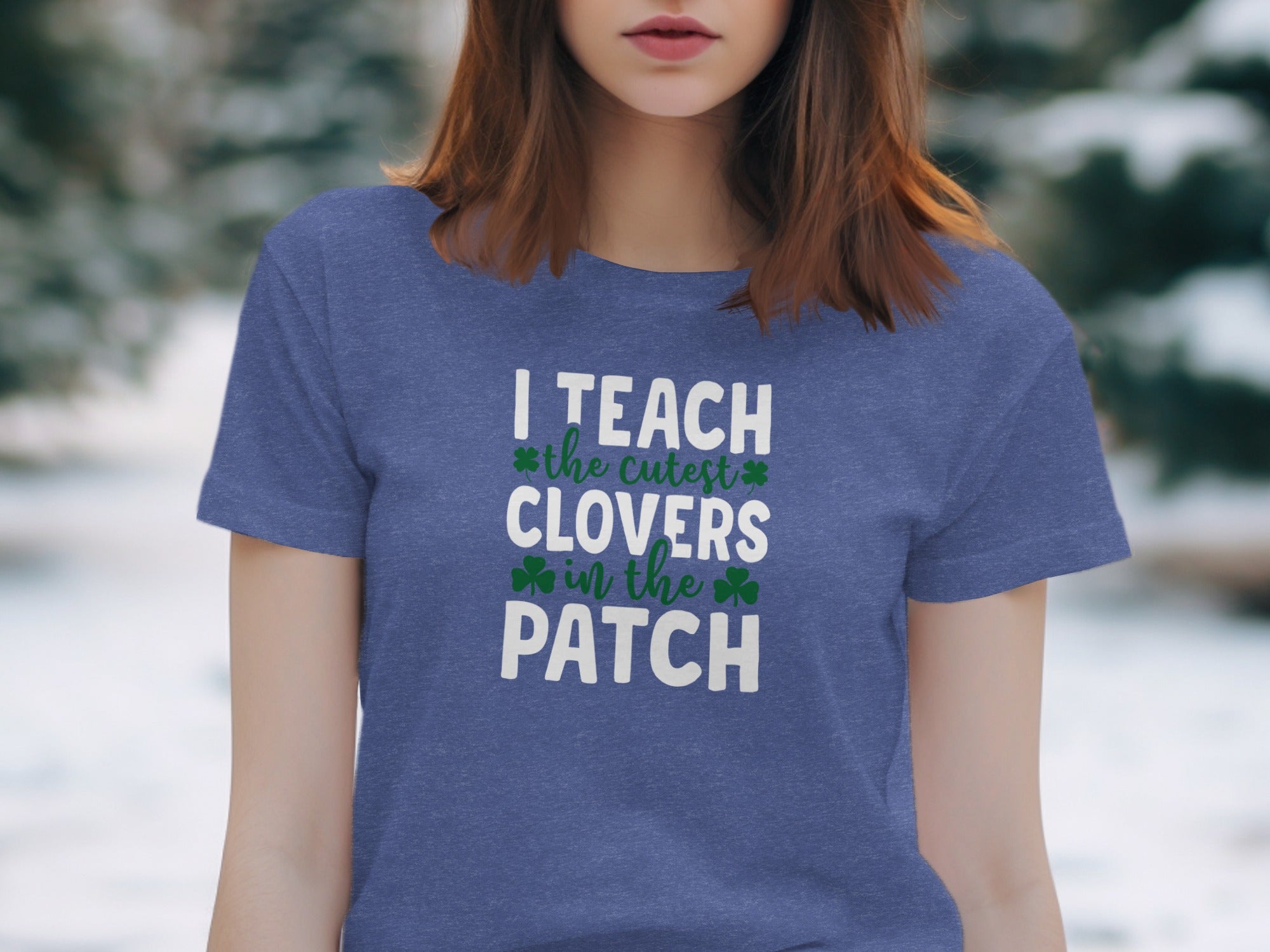 Blue t-shirt with text "I TEACH the cutest CLOVERS in the PATCH".
