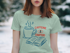 Light blue t-shirt with "CAFFEINE & CHAPTERS" text and coffee cup and book graphic.