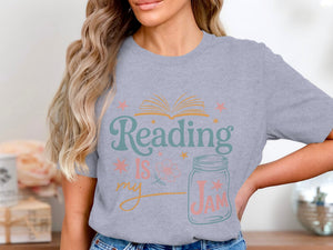 Grey t-shirt with "Reading is my Jam" text and jar graphic.