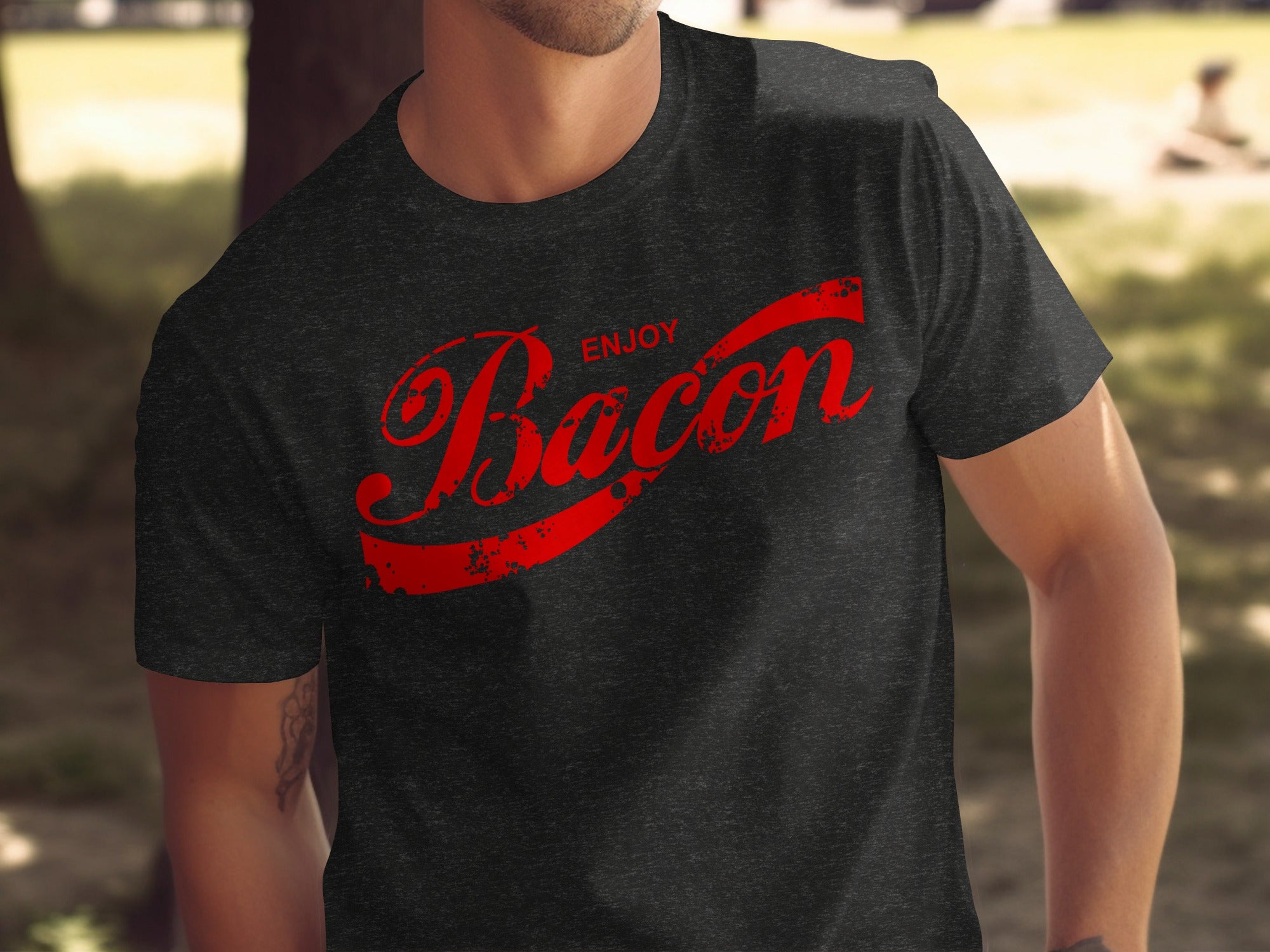 T-shirt with distressed red "Enjoy Bacon" text in a cursive font.