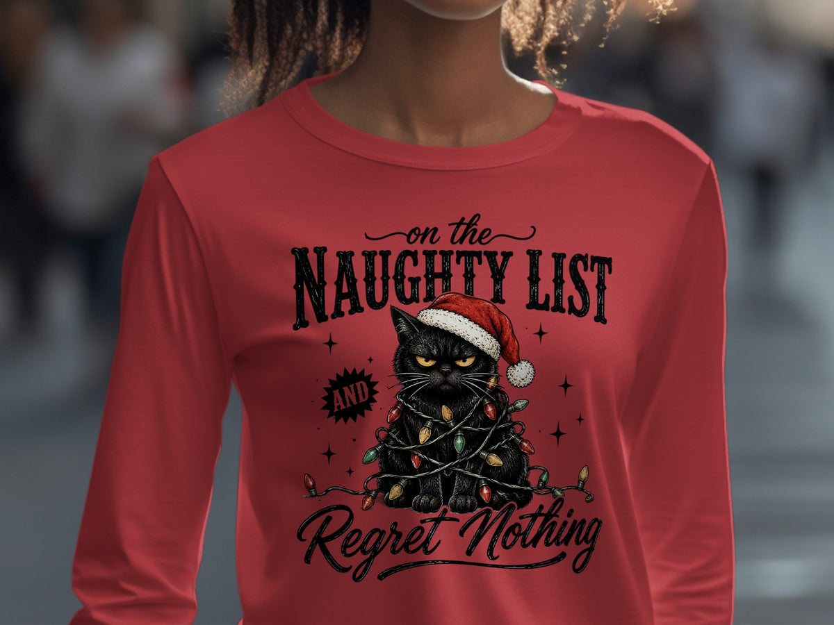 Black cat with Santa hat tangled in Christmas lights, on the naughty list.