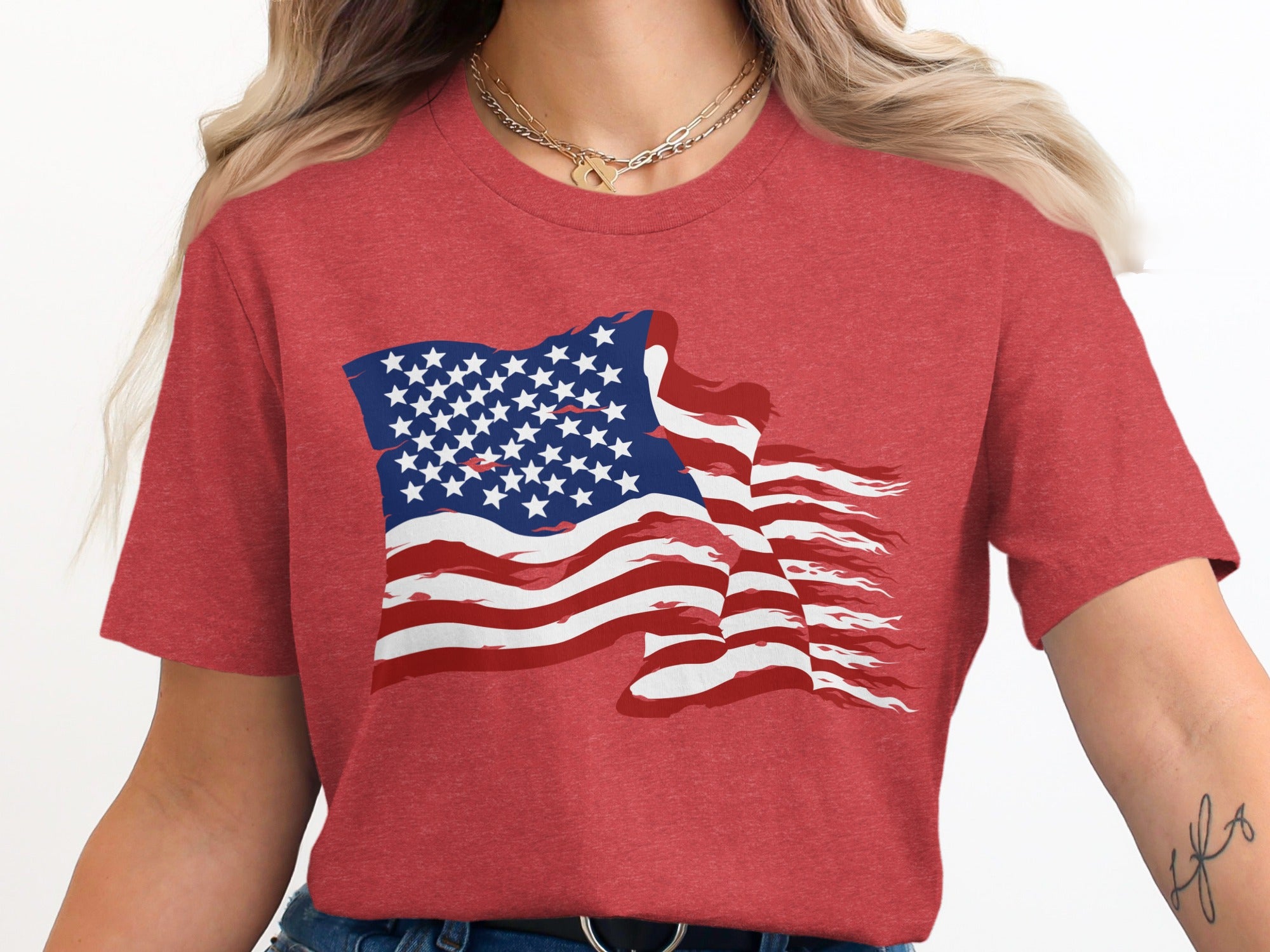 Red t-shirt with a distressed American flag graphic on the chest.