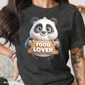 Panda holding wooden sign that says "FOOD LOVER" on a dark t-shirt.