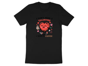 Black t-shirt with a cartoon heart holding coffee, text reads "I Don't Need a Valentine, I Need a Coffee".