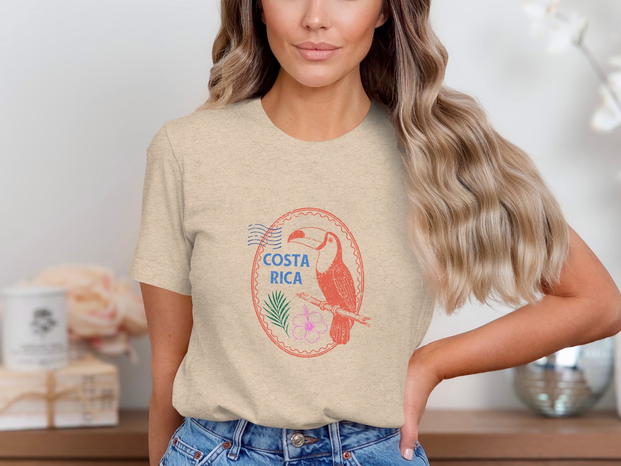 T-shirt with Costa Rica toucan and tropical flower graphic.