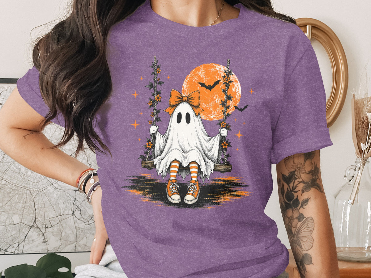 Ghost on a swing with a large moon and bats.