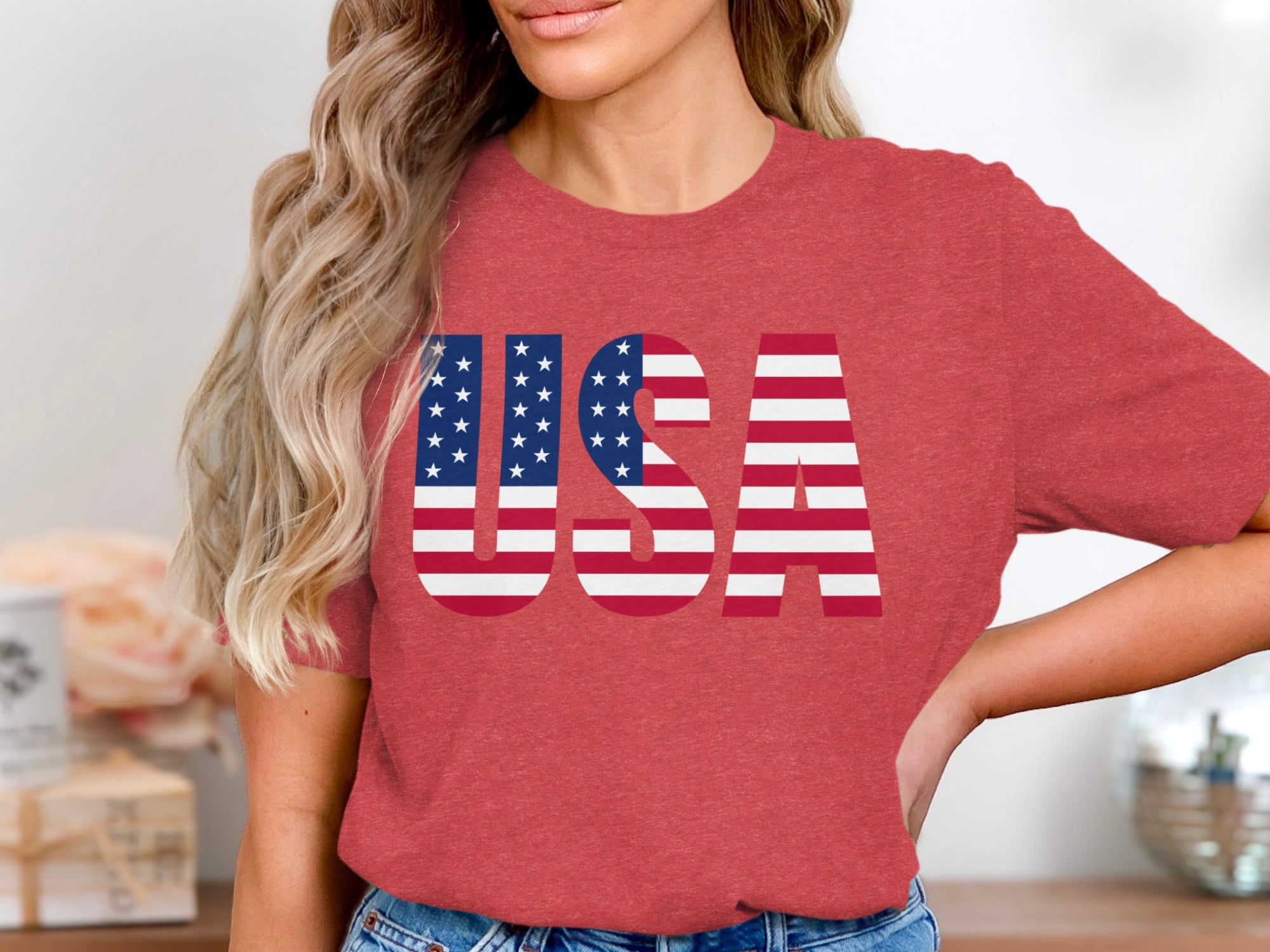 Red t-shirt with large "USA" graphic featuring American flag design.