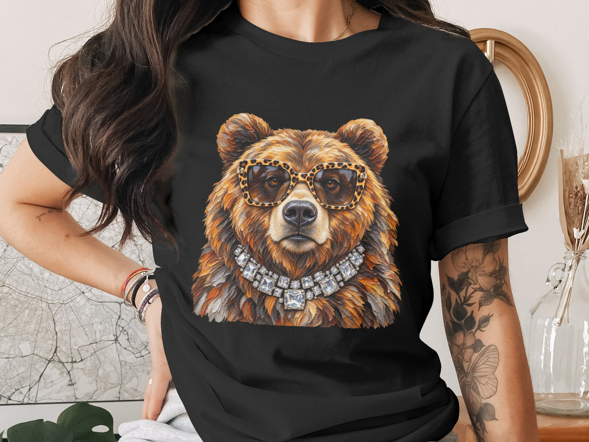Black t-shirt with a bear wearing leopard print sunglasses and a diamond necklace.