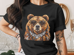 Black t-shirt with a bear wearing leopard print sunglasses and a diamond necklace.