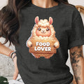 Cartoon llama holding a "Food Lover" wooden sign on a dark t-shirt.