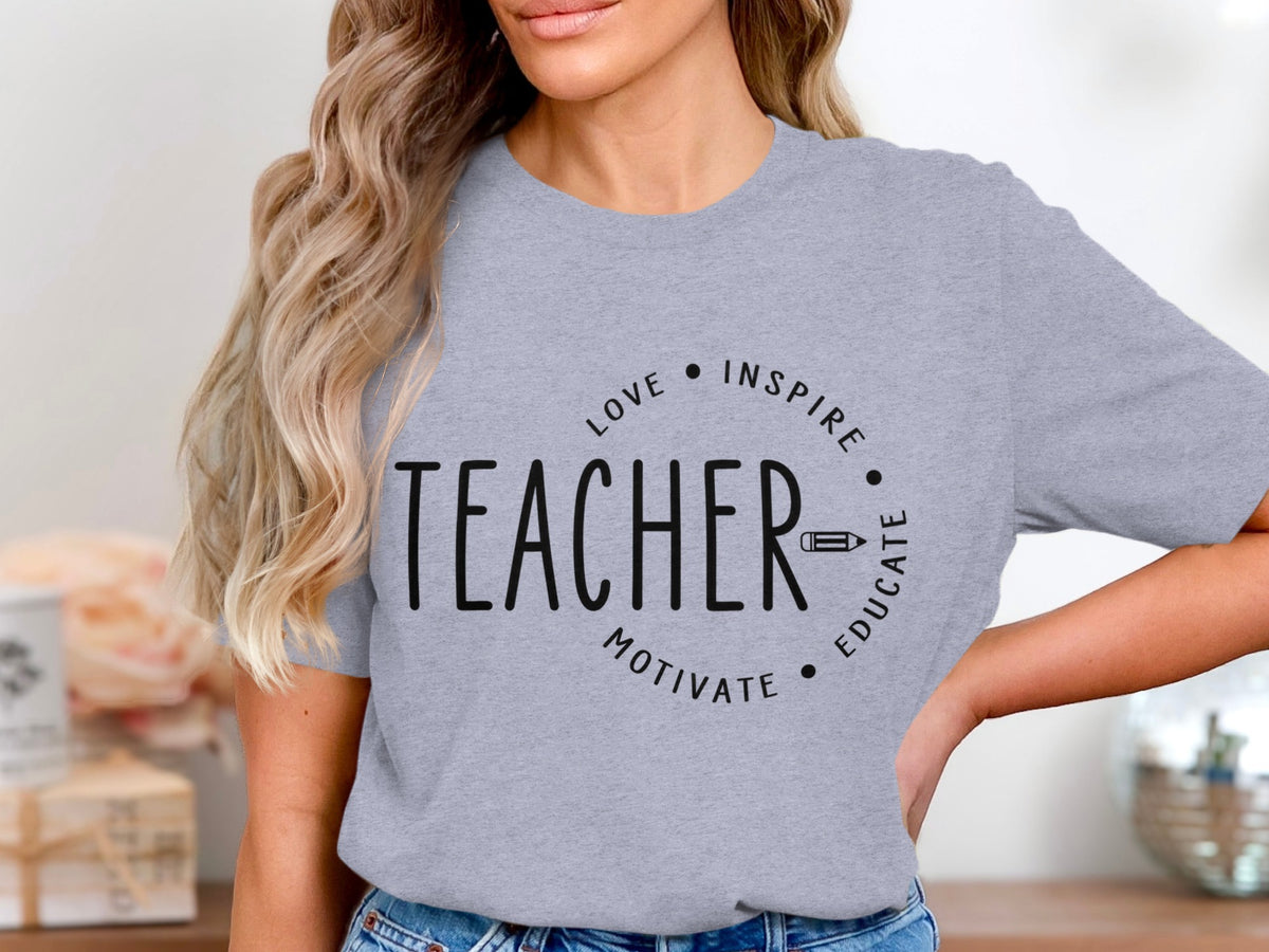 Grey t-shirt with "TEACHER" text and "LOVE INSPIRE MOTIVATE EDUCATE" circle.