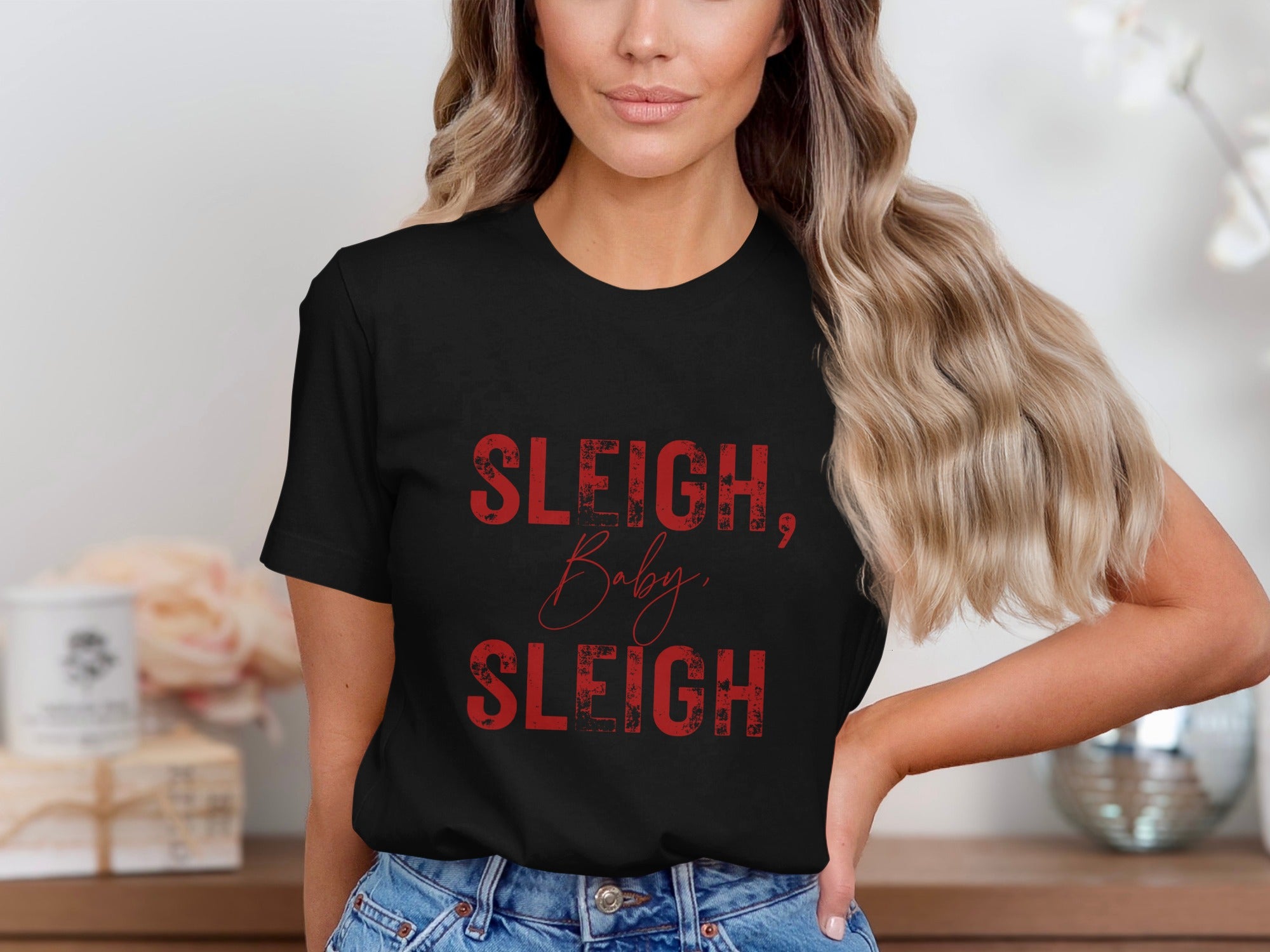 Black t-shirt with red text "Sleigh, Baby, Sleigh".