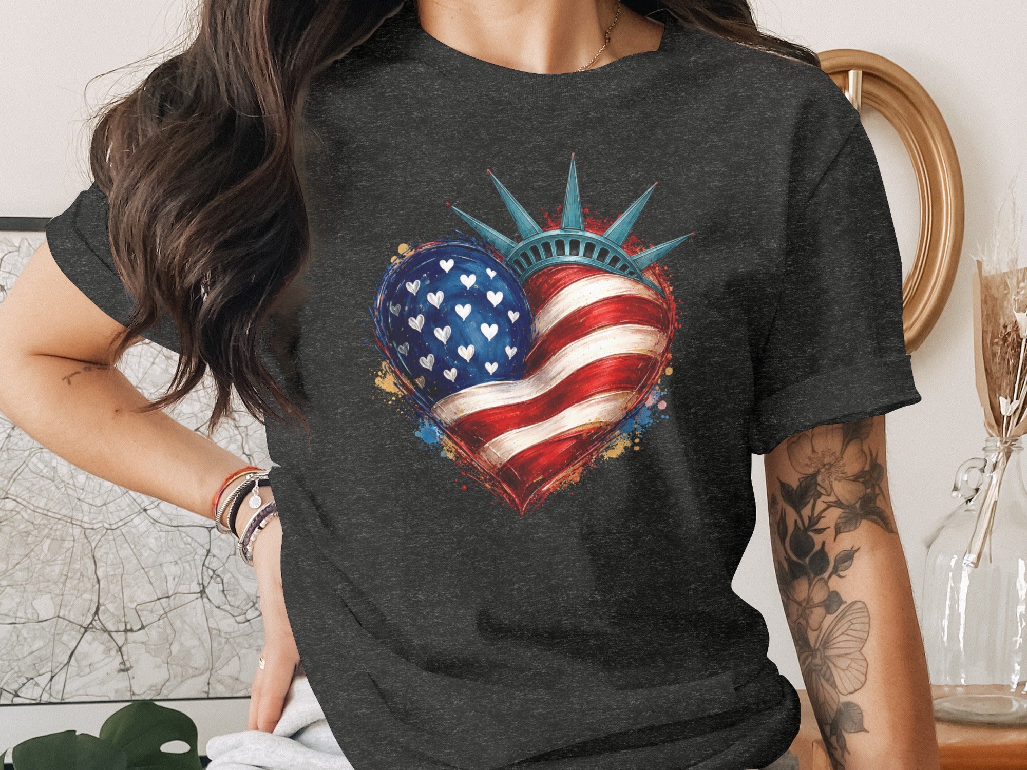 Dark gray t-shirt with a heart-shaped American flag and Statue of Liberty crown graphic.