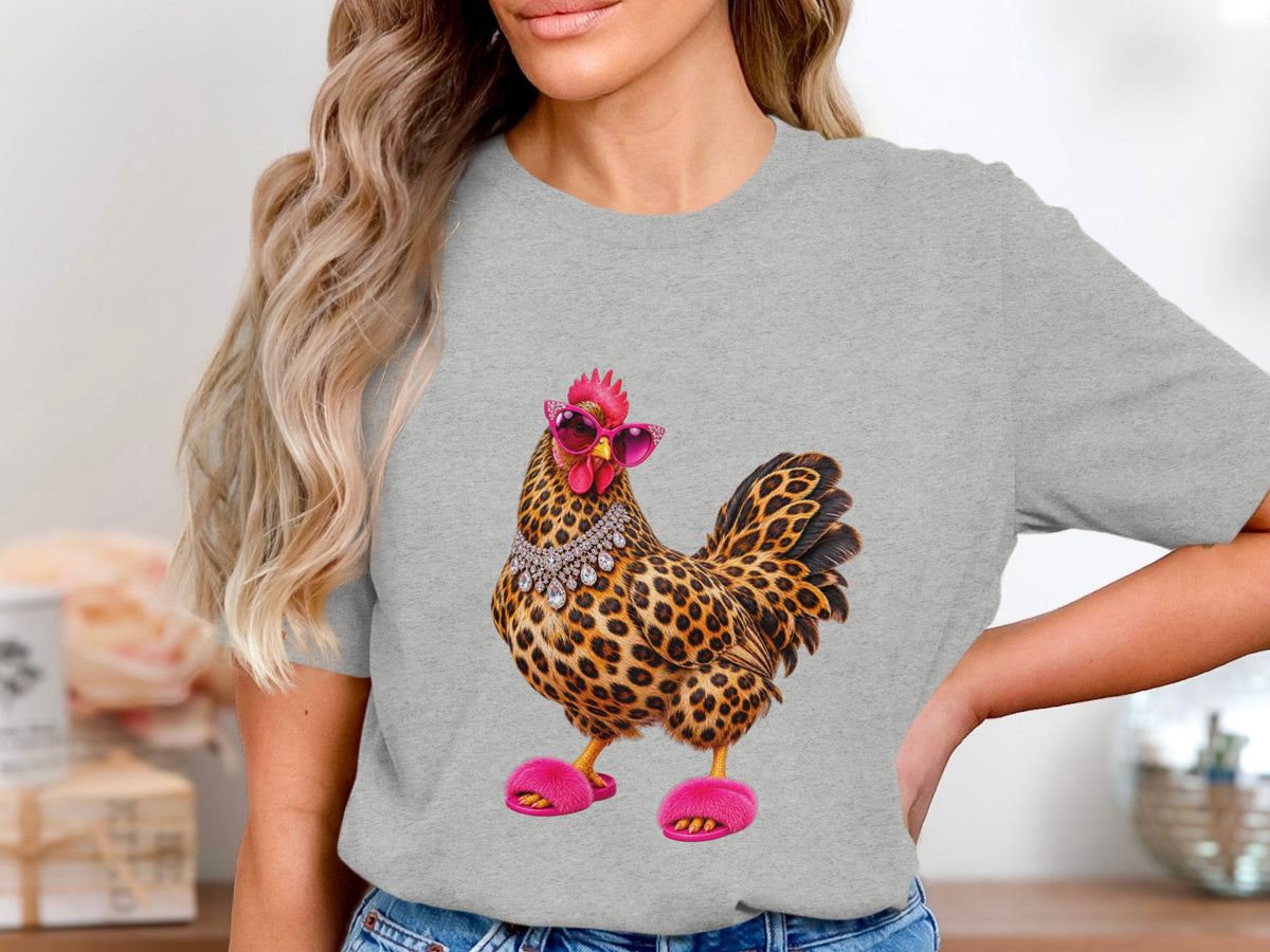 Leopard print chicken wearing pink sunglasses, jewelry, and fuzzy slippers.