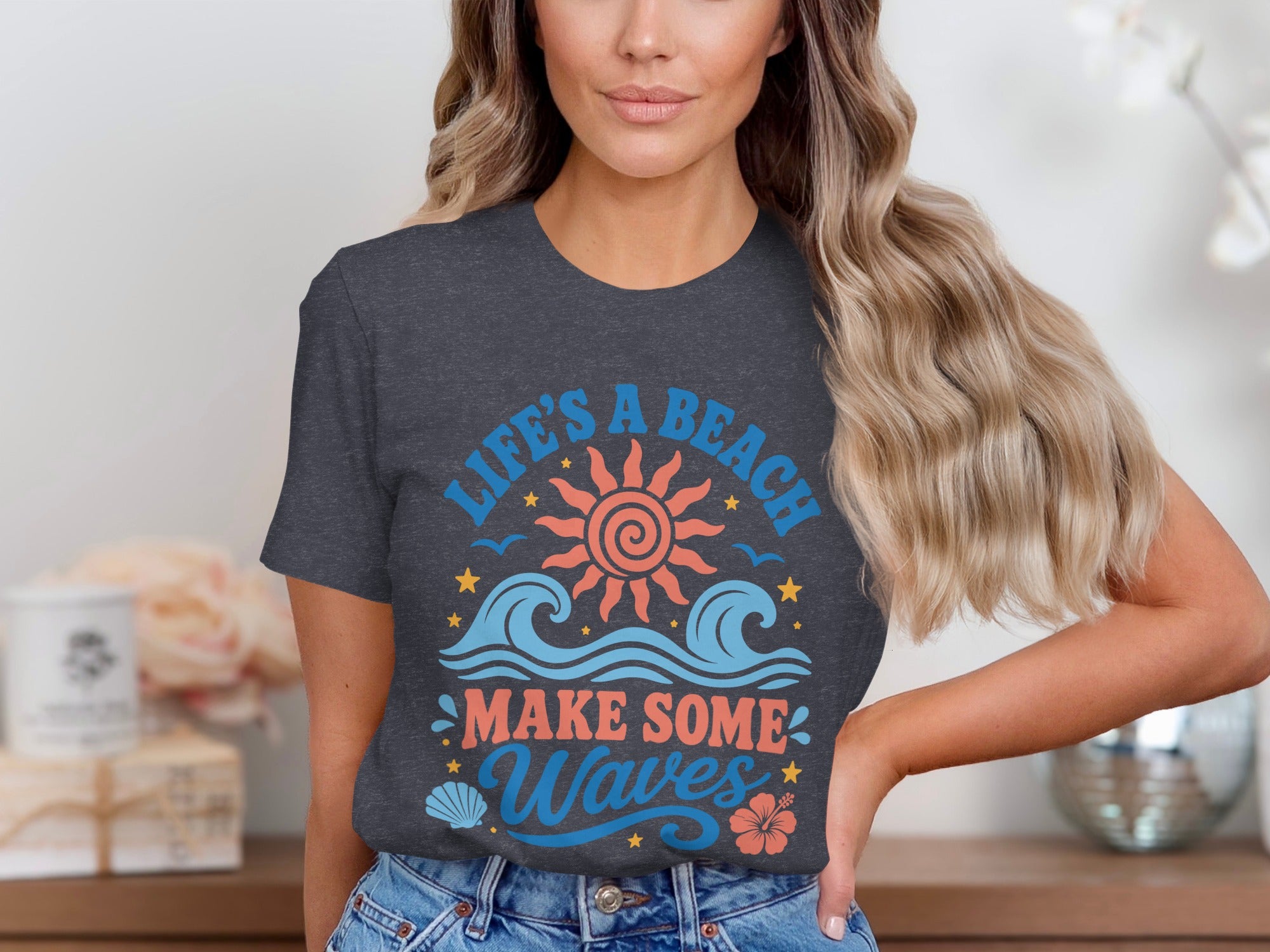 Dark grey t-shirt with "Life's a beach make some waves" beach graphic.