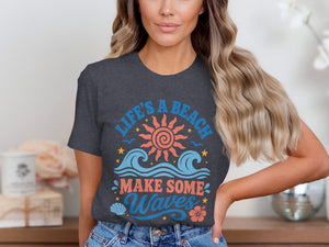 Dark grey t-shirt with "Life's a beach make some waves" beach graphic.
