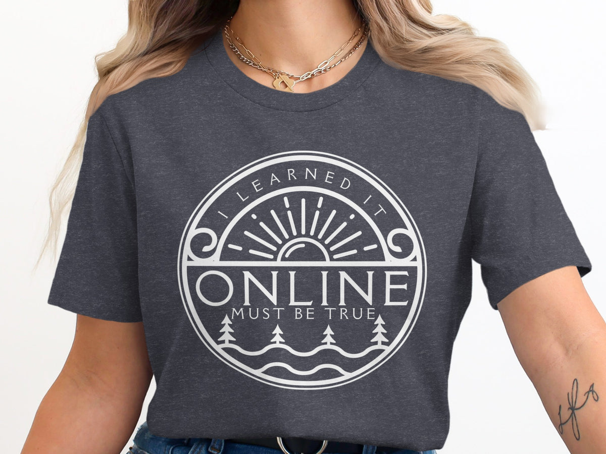 Dark grey t-shirt with white circle graphic "I LEARNED IT ONLINE MUST BE TRUE".