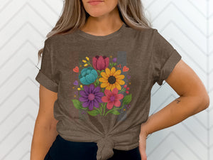 Brown t-shirt with a vibrant floral bouquet graphic featuring hearts and small yellow crosses.