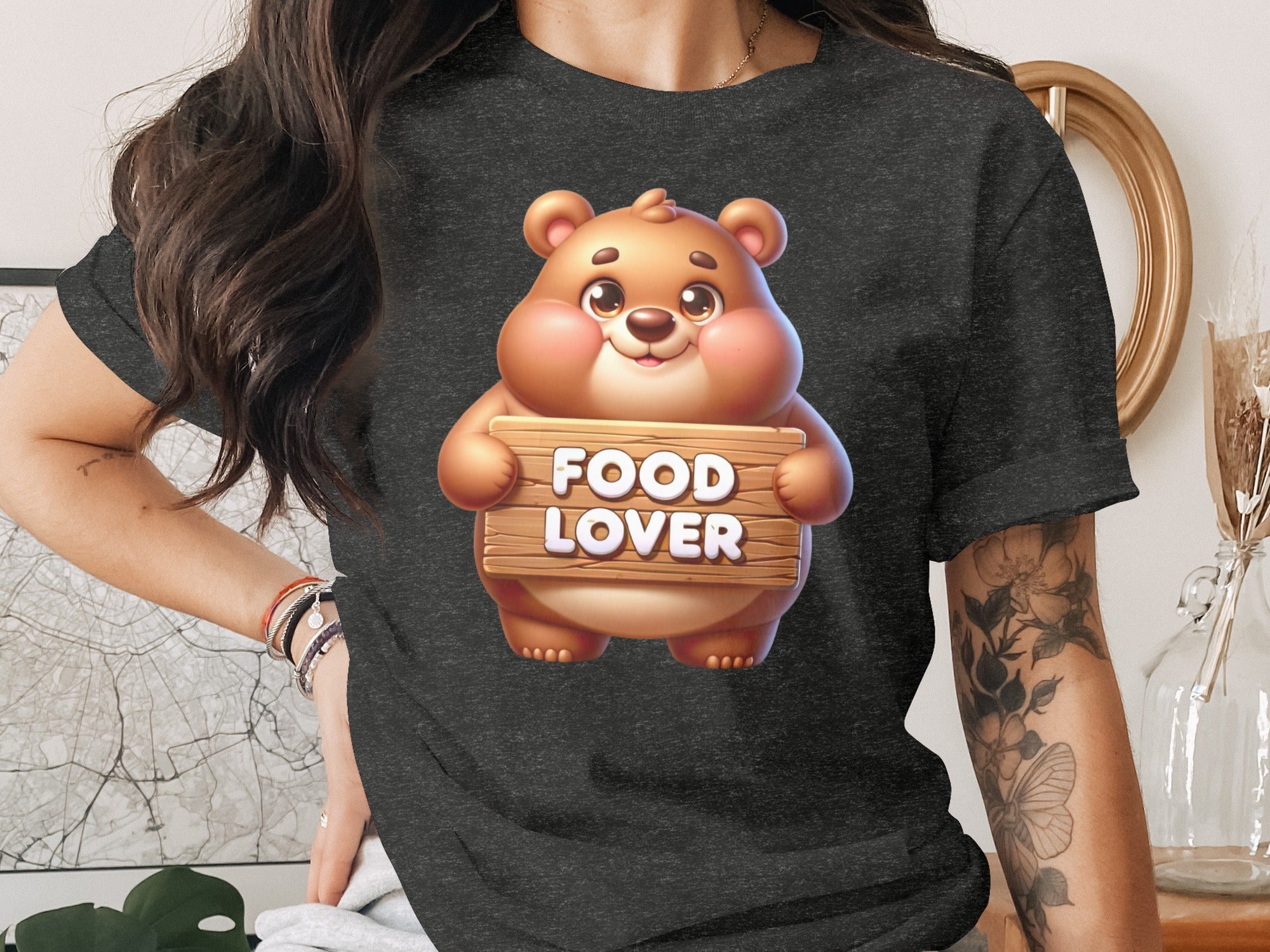 Cartoon bear holding a wooden sign with "FOOD LOVER" text.