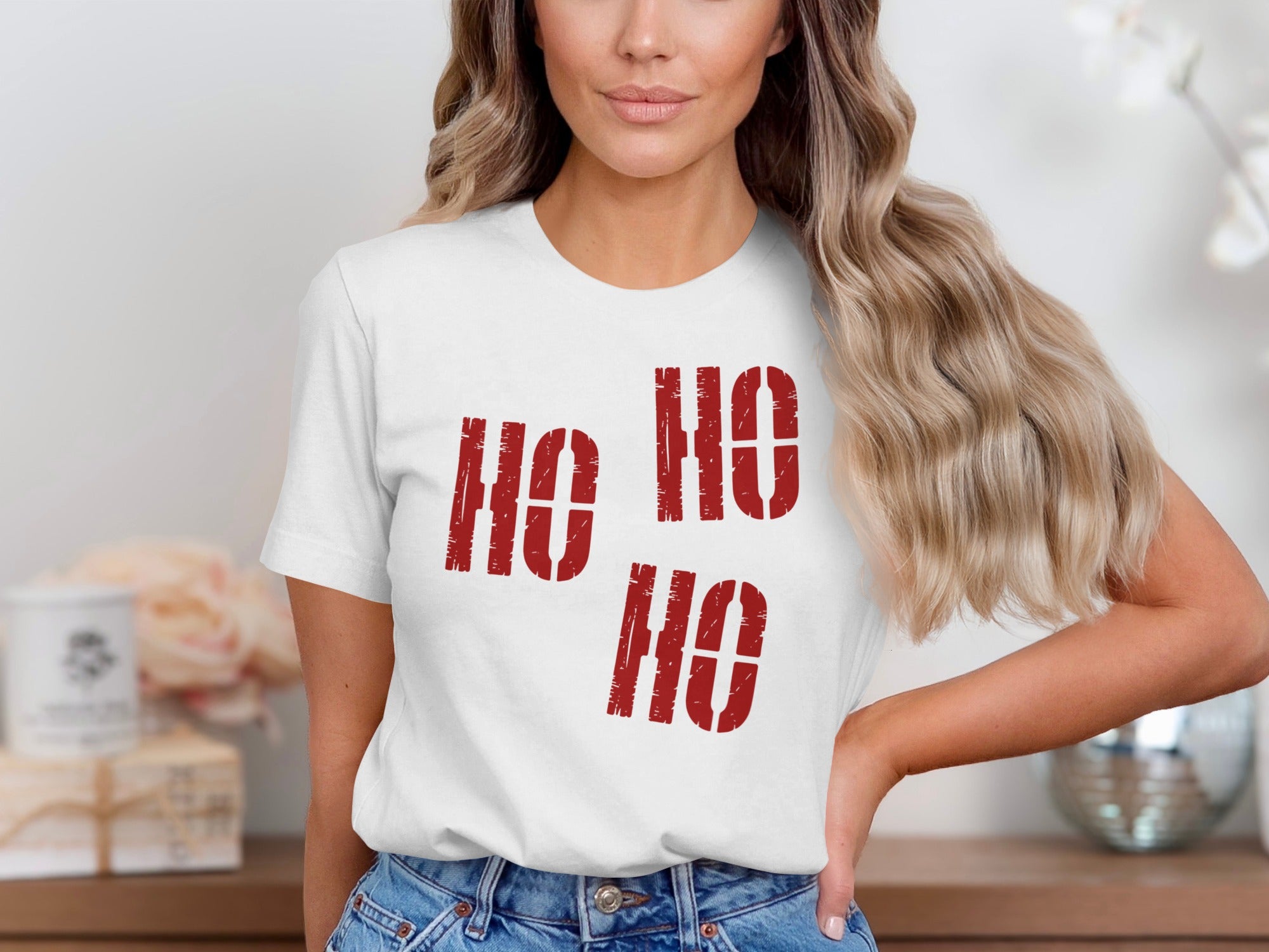 White t-shirt with red "HO HO HO" graphic design on chest.