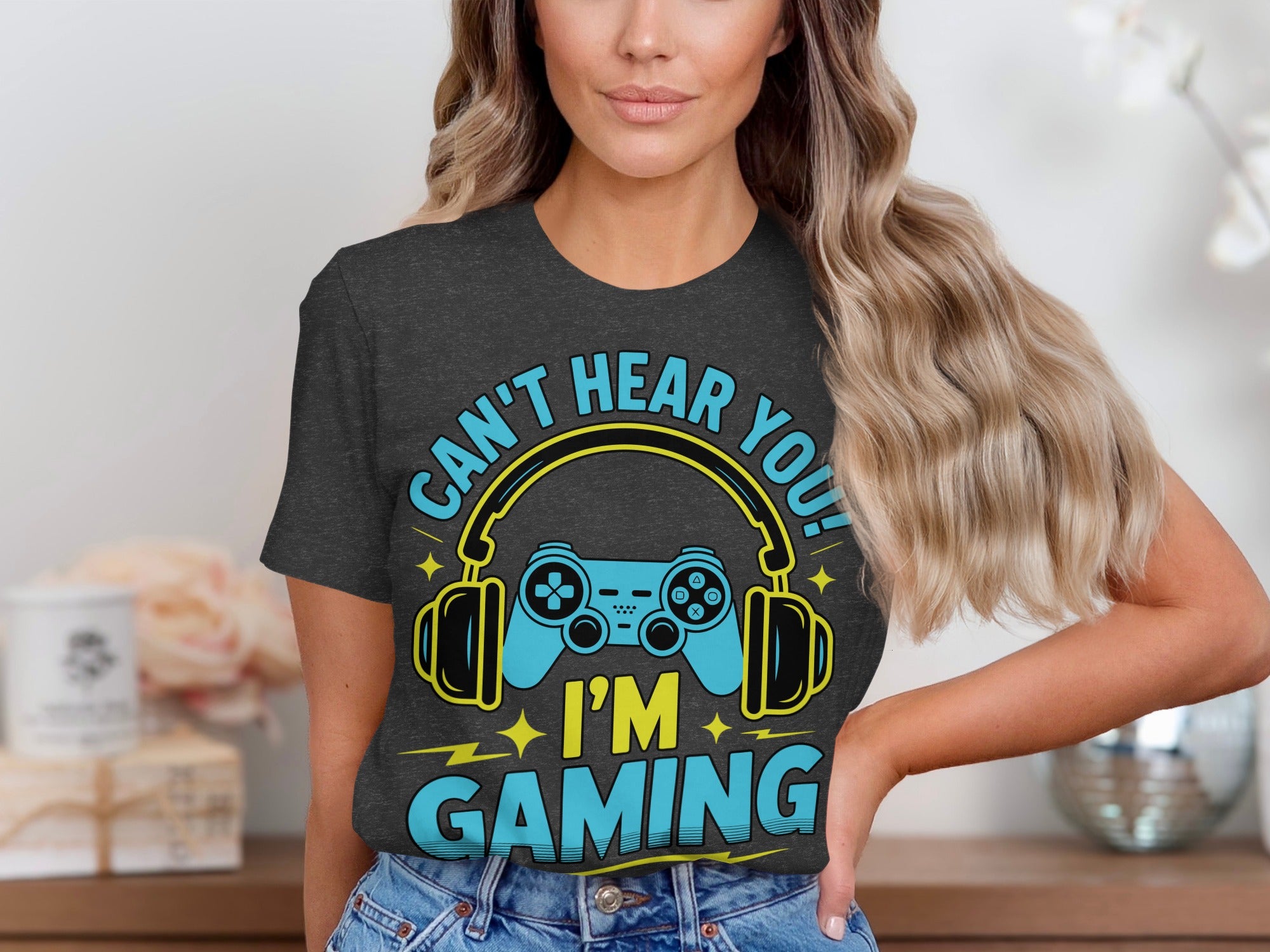 T-shirt with text "CAN'T HEAR YOU! I'M GAMING" and gaming controller graphic.