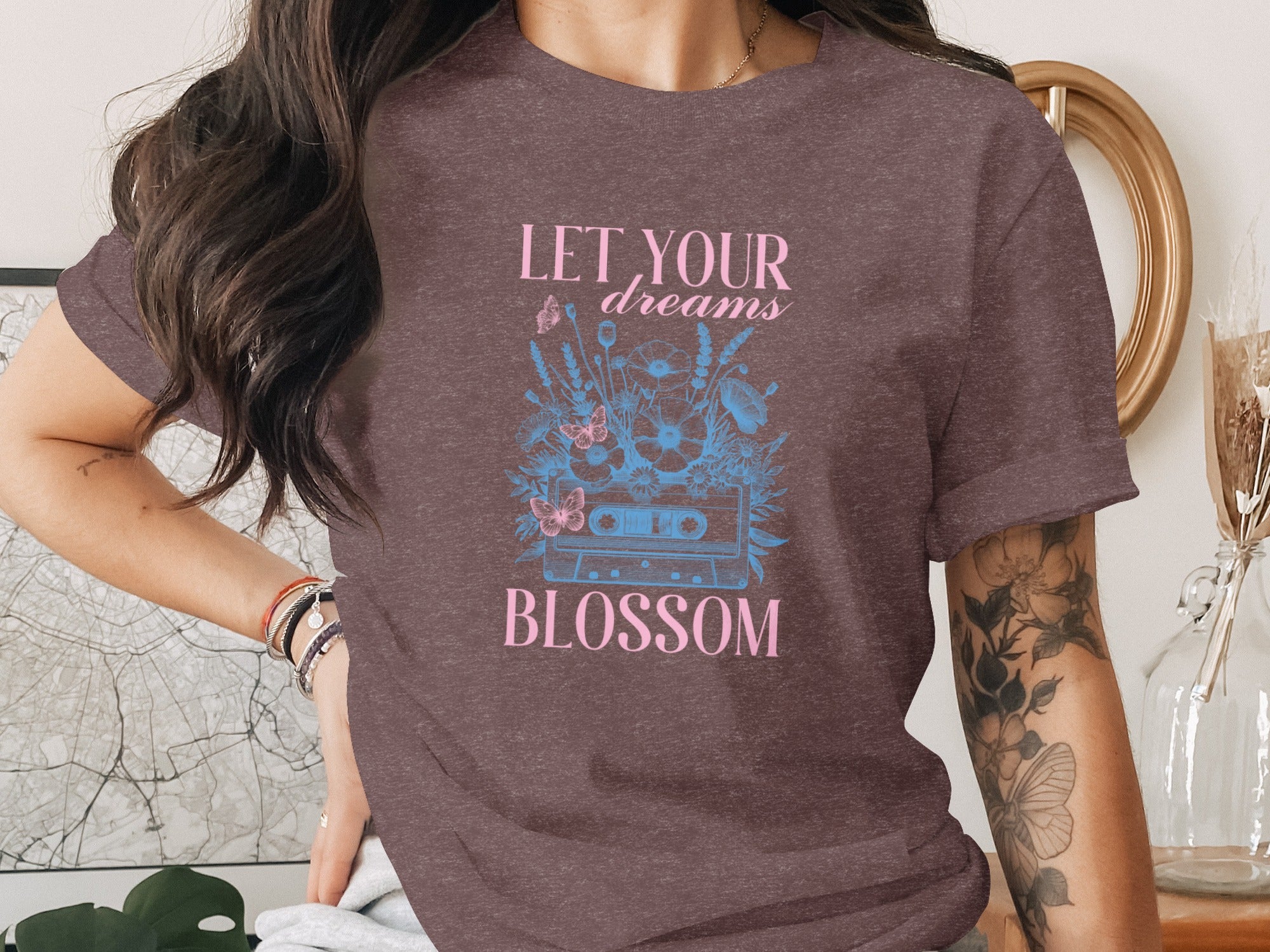 Brown t-shirt with "LET YOUR dreams BLOSSOM" text and cassette tape floral design.