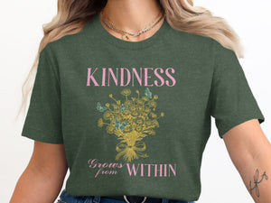 Dark green t-shirt with "KINDNESS Grows from WITHIN" text and floral graphic.