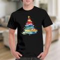 Black t-shirt featuring a watercolor Christmas tree with colorful brushstrokes and ornaments.