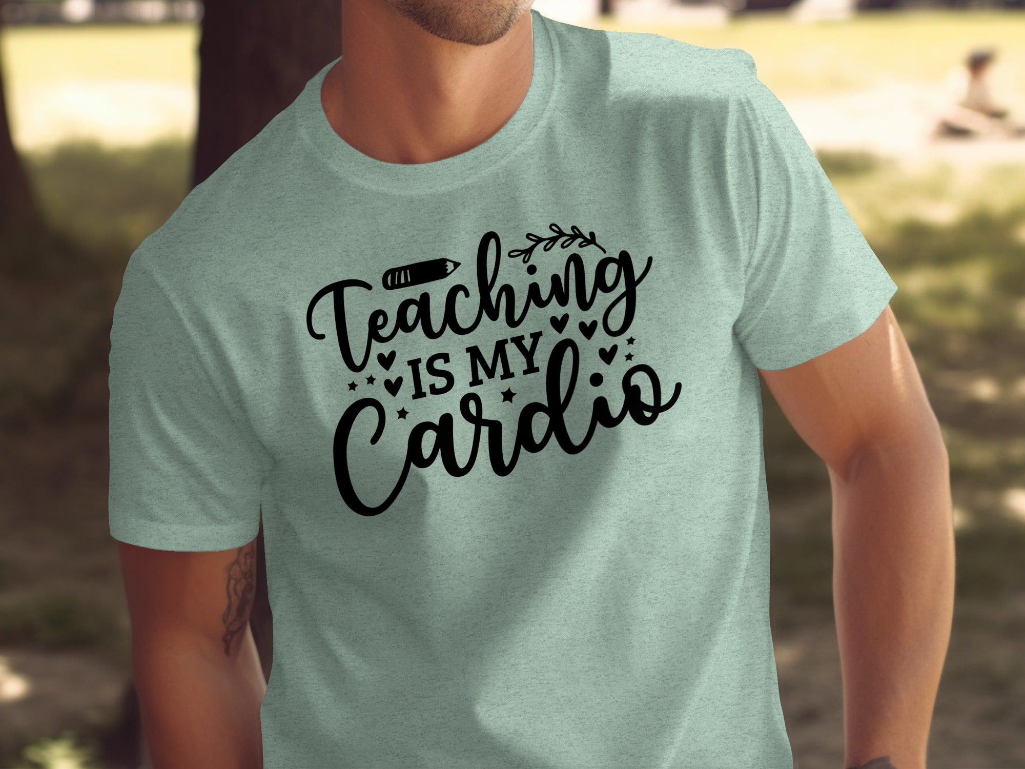 Light blue t-shirt with black text that reads "Teaching IS MY Cardio."