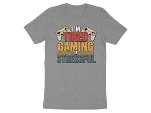 Gray t-shirt with "I'm Tired Gaming Is Stressful" text and gaming controllers.