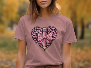 Pink t-shirt with heart graphic featuring a pink pencil and leopard print.