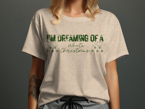 Light tan t-shirt with green text "I'M DREAMING OF A White Christmas" and snowflakes.