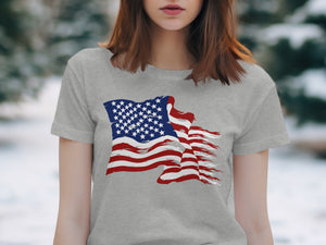 Grey t-shirt with a tattered American flag graphic on the front.