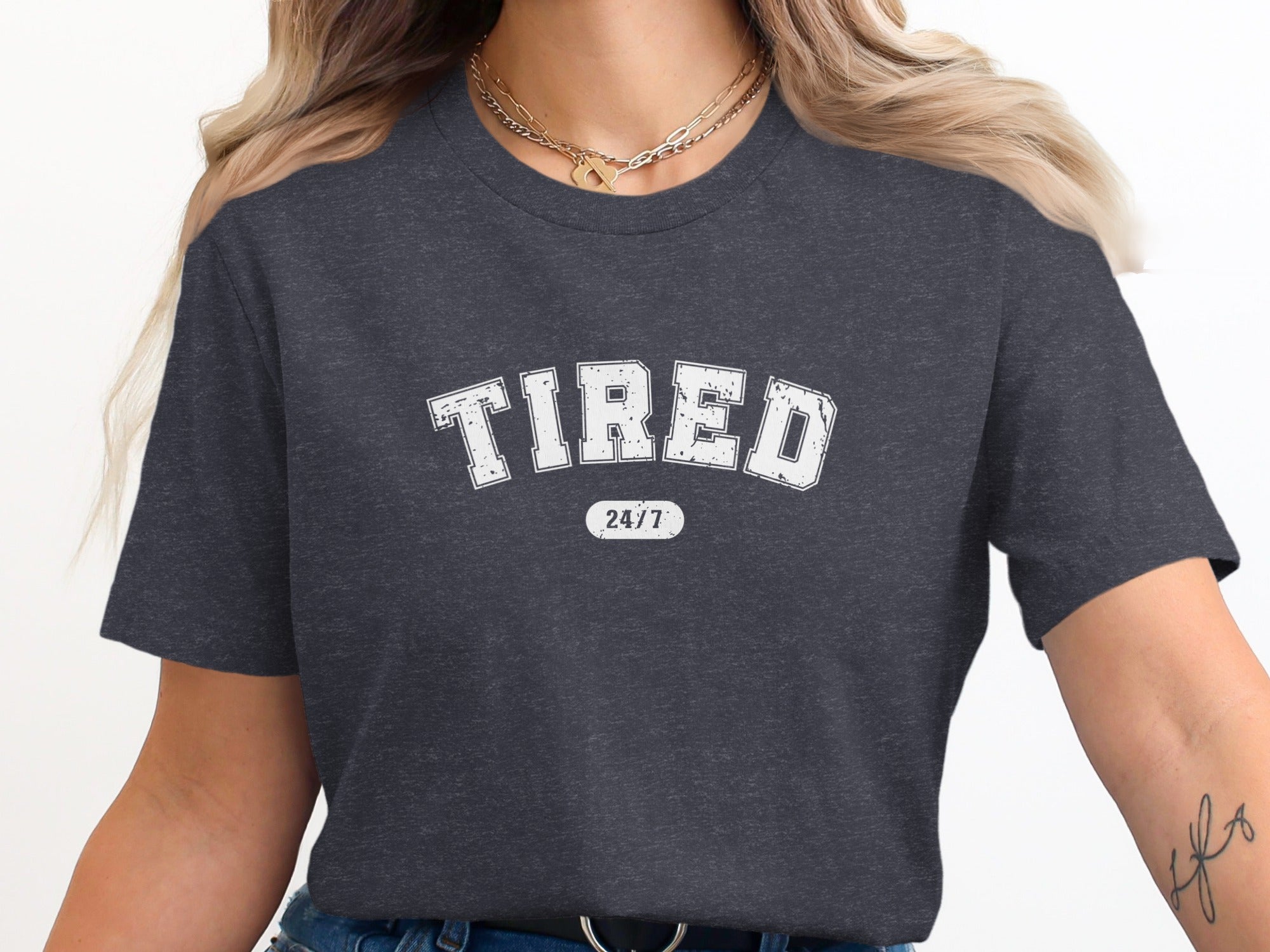 Dark grey t-shirt with white "TIRED 24/7" text.