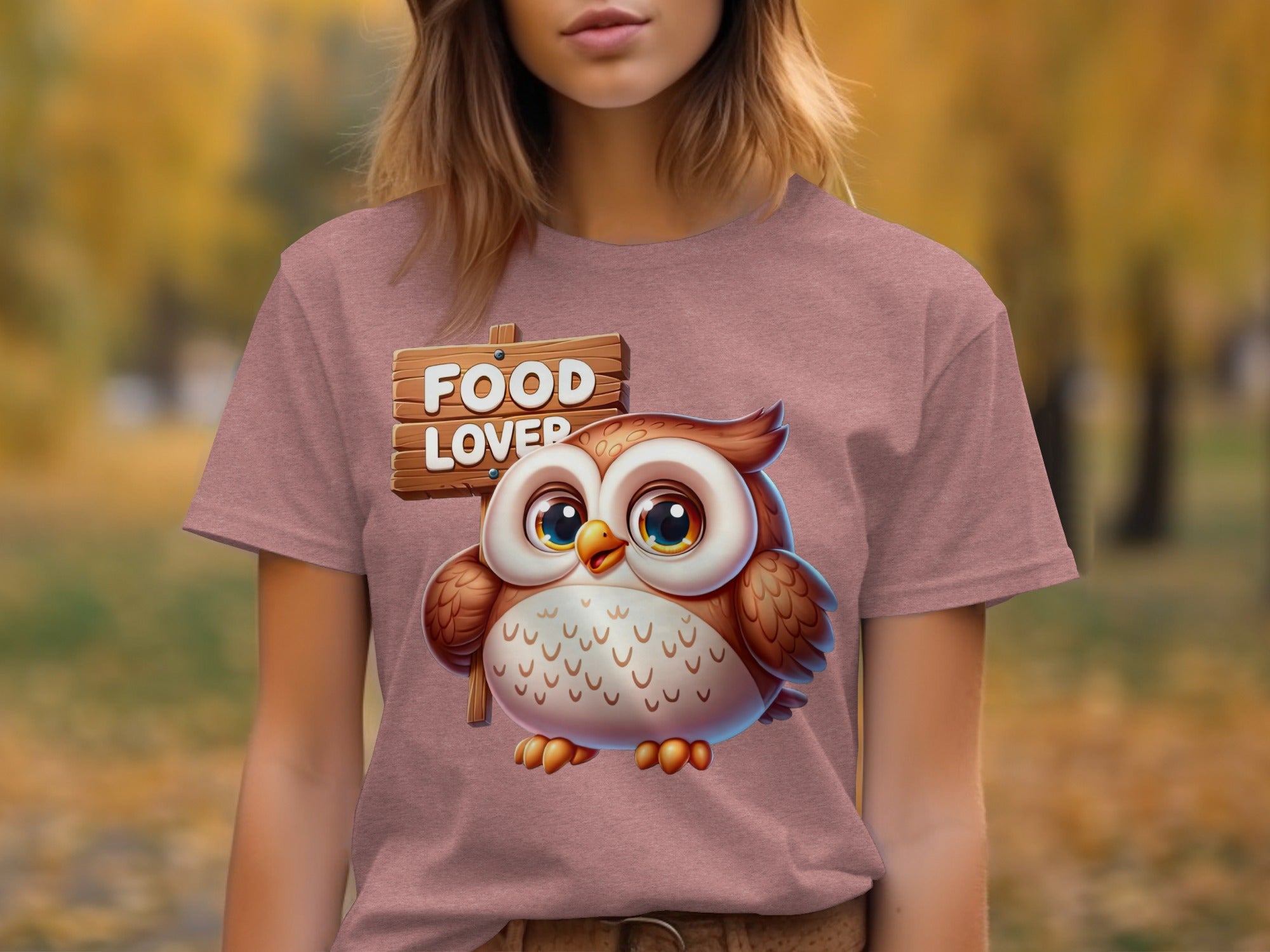 T-shirt featuring a cartoon owl with a "Food Lover" sign.