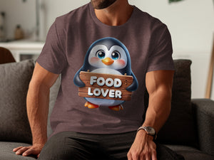 Penguin graphic with "FOOD LOVER" text on a brown t-shirt.
