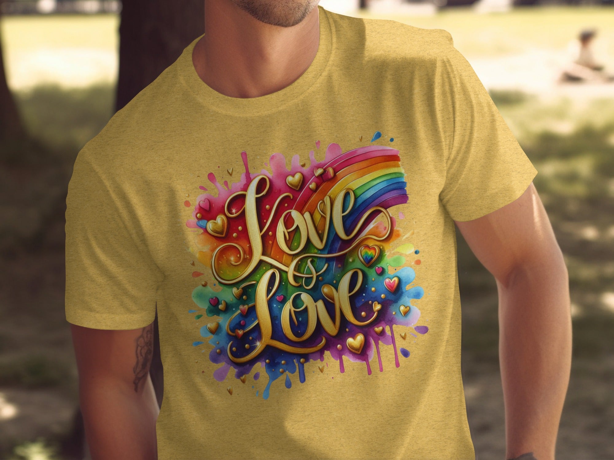 Yellow t-shirt with "Love is Love" text and rainbow heart graphic.