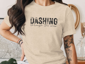 T-shirt with distressed "Dashing through the snow" text.