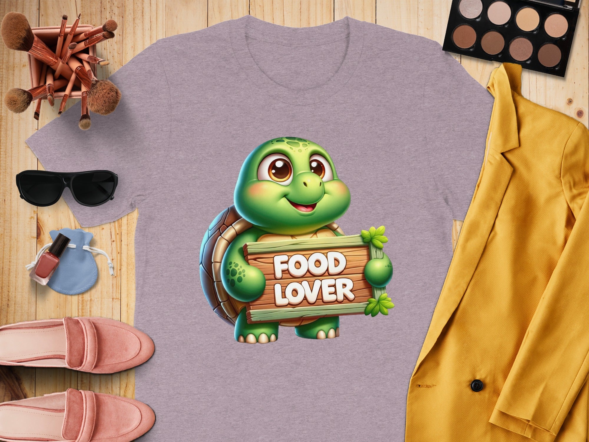 Purple t-shirt with a cartoon turtle holding a "Food Lover" sign.