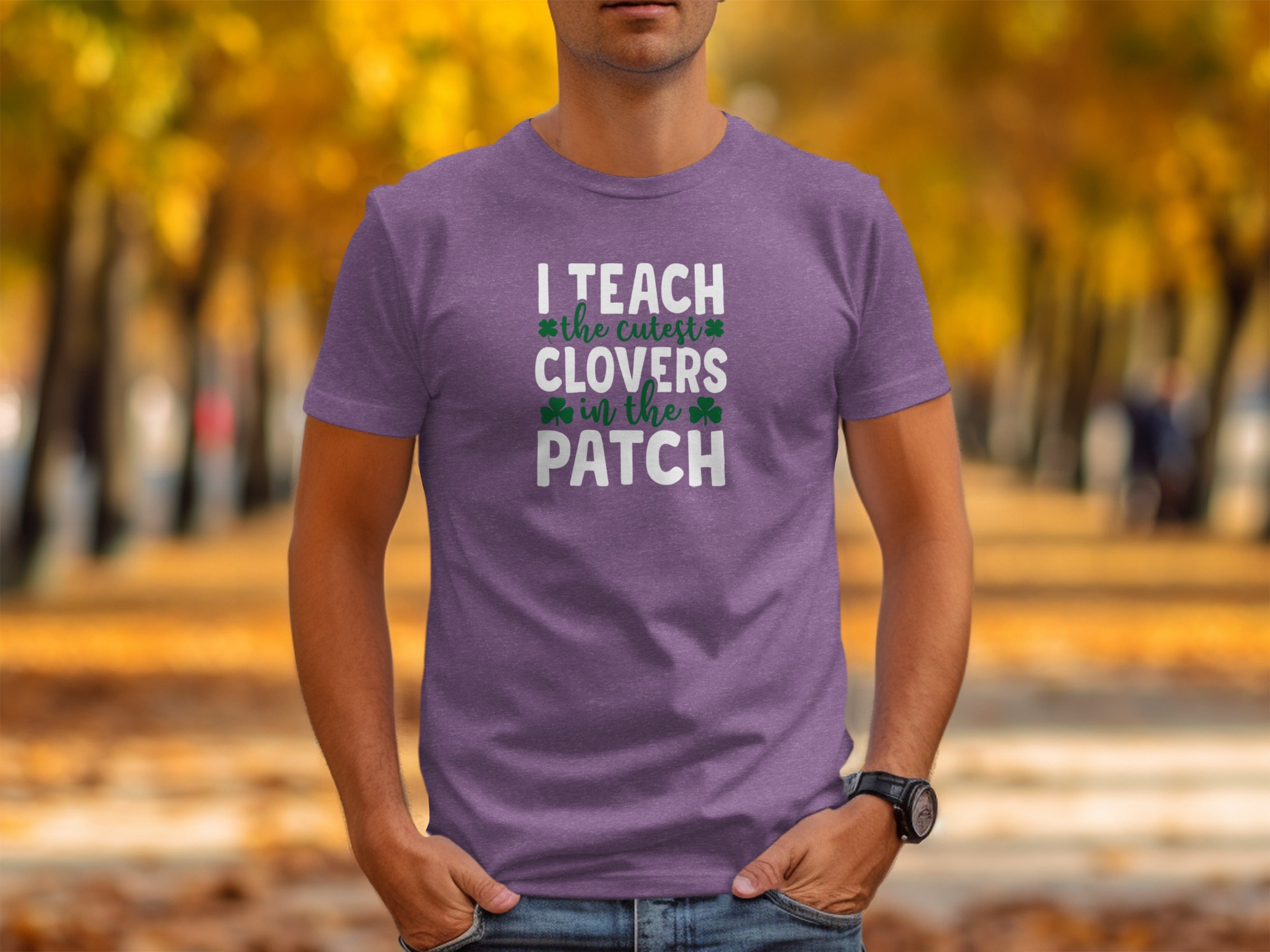 Purple t-shirt with text "I TEACH the cutest CLOVERS in the PATCH"