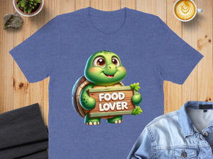 Cartoon turtle holding sign that says "FOOD LOVER" on a blue t-shirt.