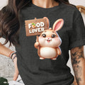 Cartoon bunny holding wooden sign with "FOOD LOVER" and carrots.
