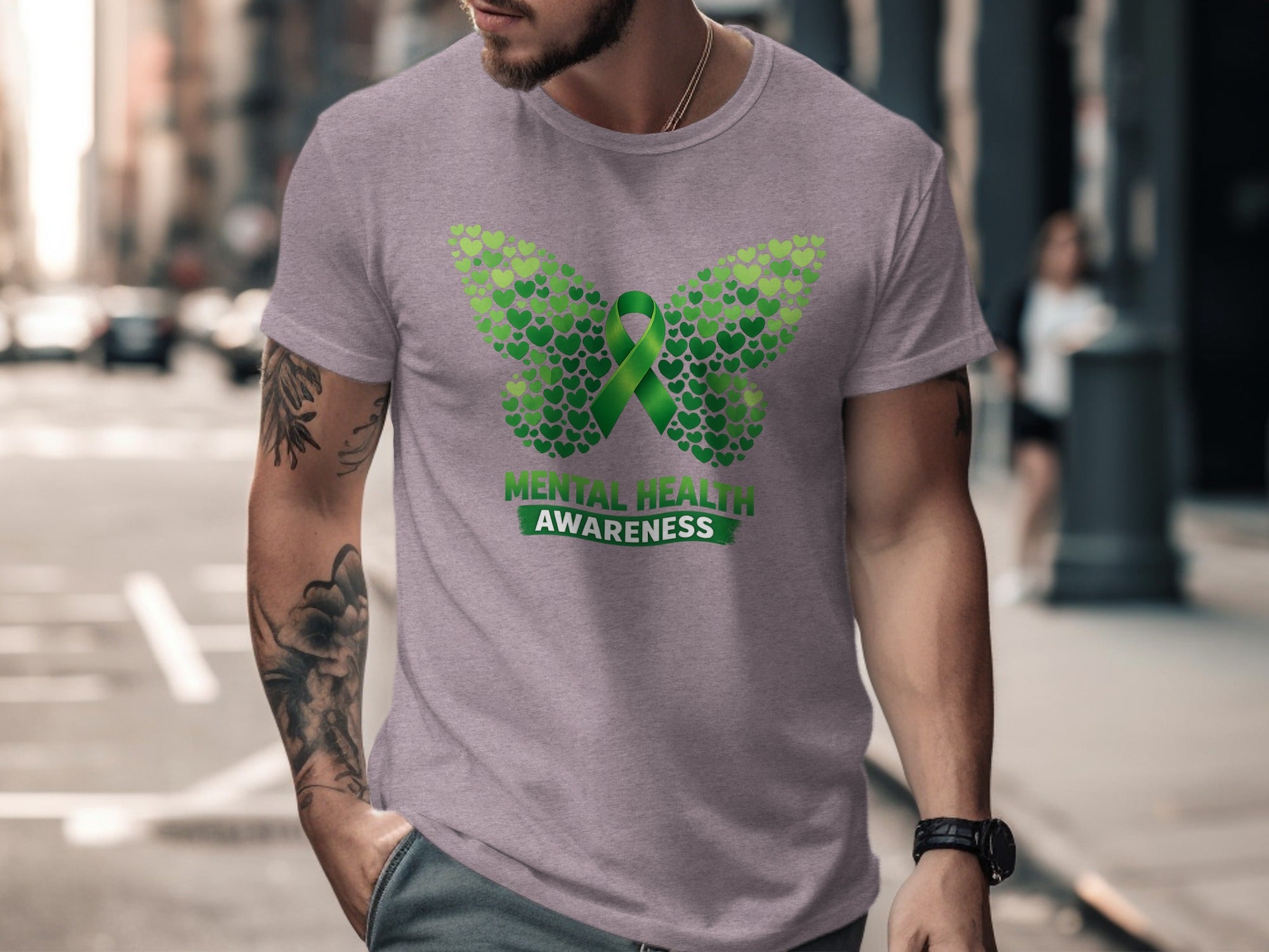 Gray t-shirt with a green butterfly made of hearts and "Mental Health Awareness" text.