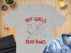 Grey t-shirt with "HOT GIRLS READ BOOKS" text and book drawing.