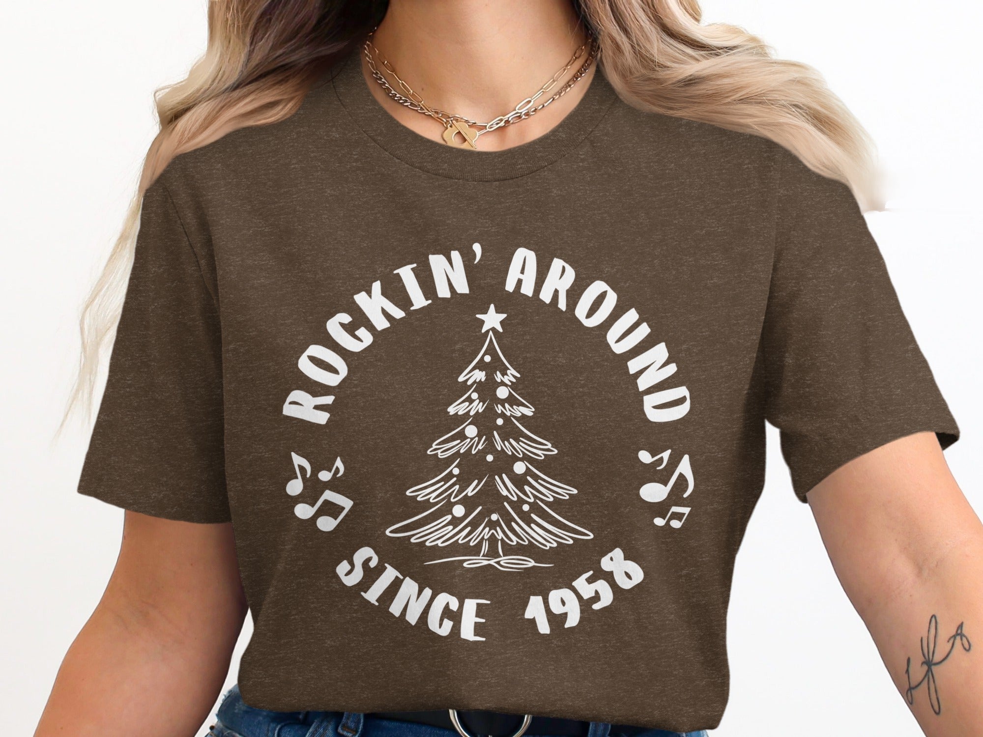 Brown t-shirt with white graphic: "ROCKIN' AROUND SINCE 1958" and a Christmas tree.