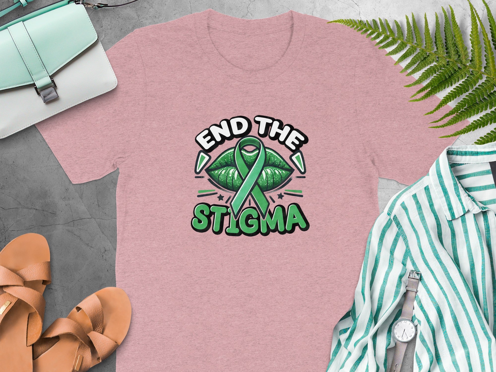 Pink t-shirt with green lips, ribbon, and text "End the Stigma".