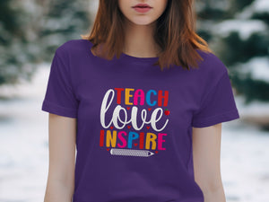 Purple t-shirt with "Teach Love Inspire" text and a pencil graphic.
