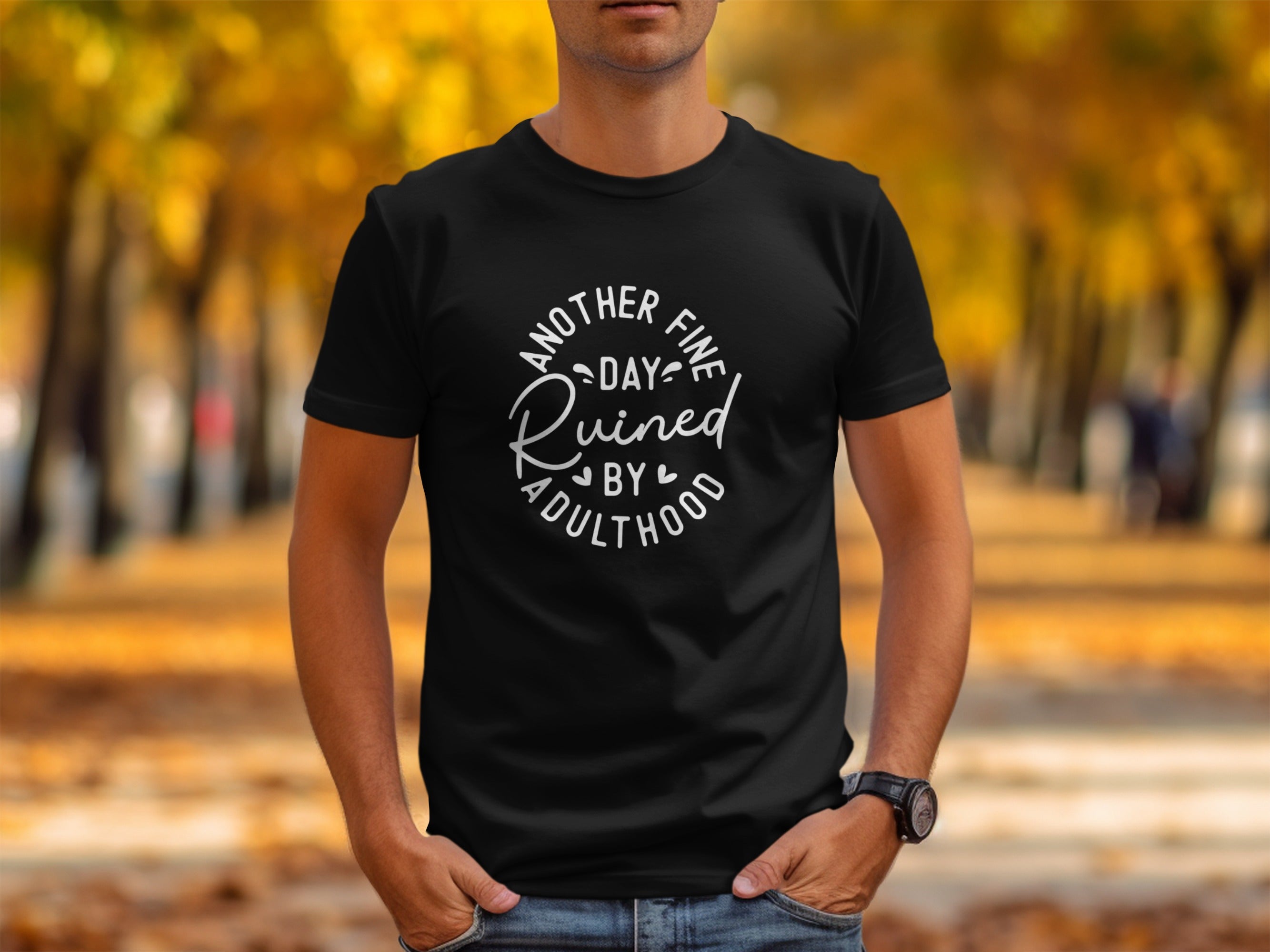 Black t-shirt with white text that reads "Another fine day ruined by adulthood".